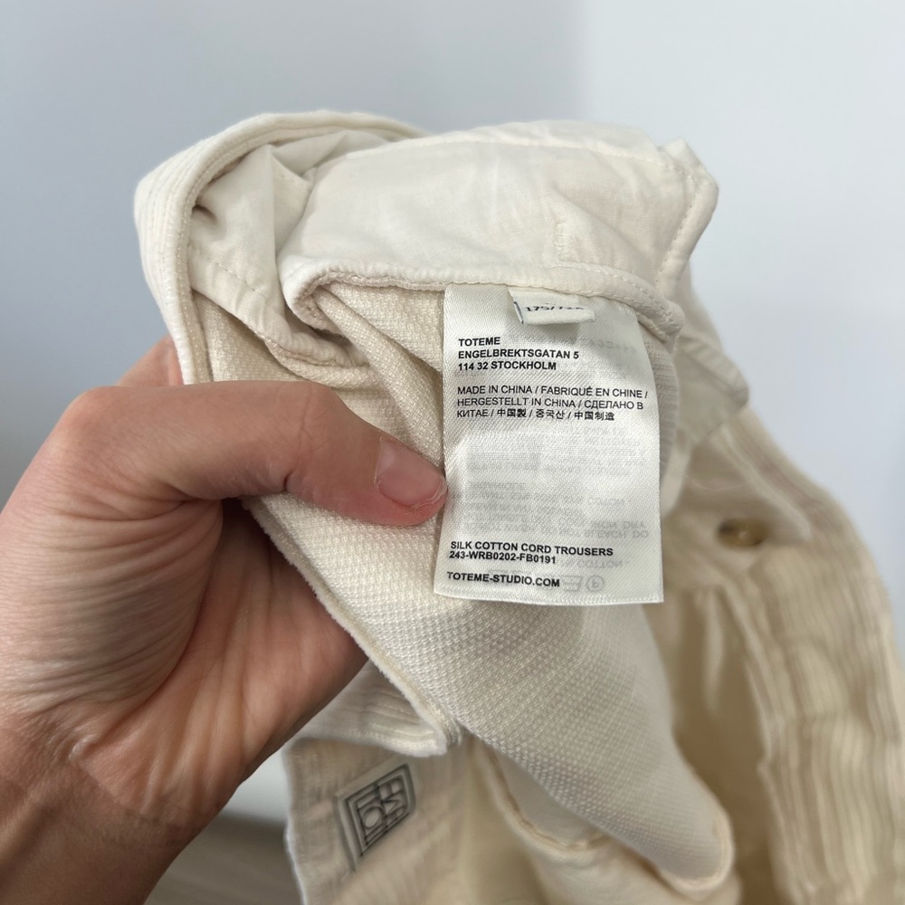 Toteme Pleated Silk and Organic Cotton-Blend Corduroy Wide-Leg Pants in Ecru - Picture 9 of 11